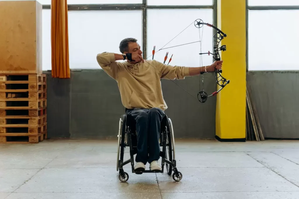 An Archer Pulling and Aiming a Compound Bow